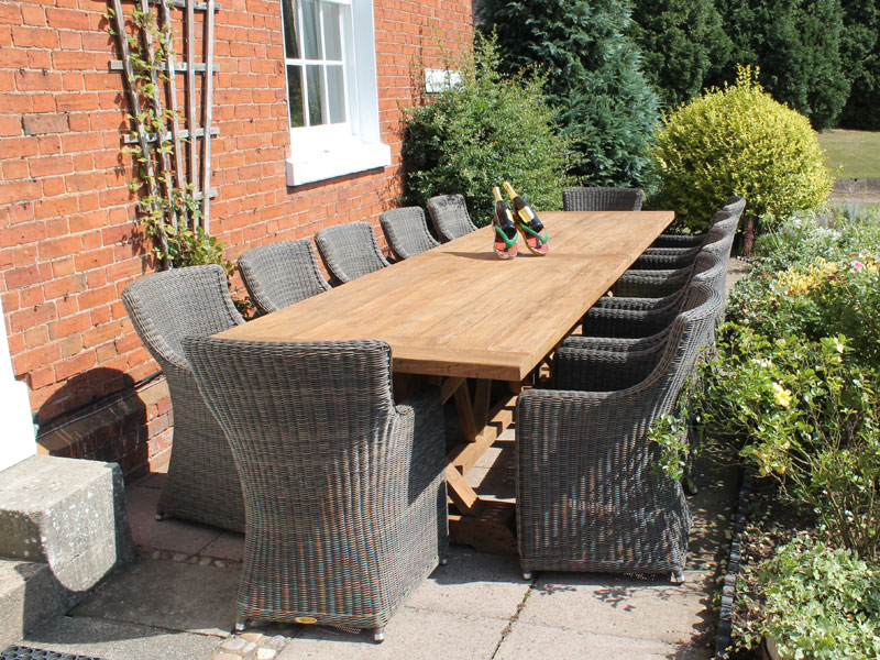 Product photograph of Valencia 12 Chair Dining Set from The Garden Furniture Centre Ltd