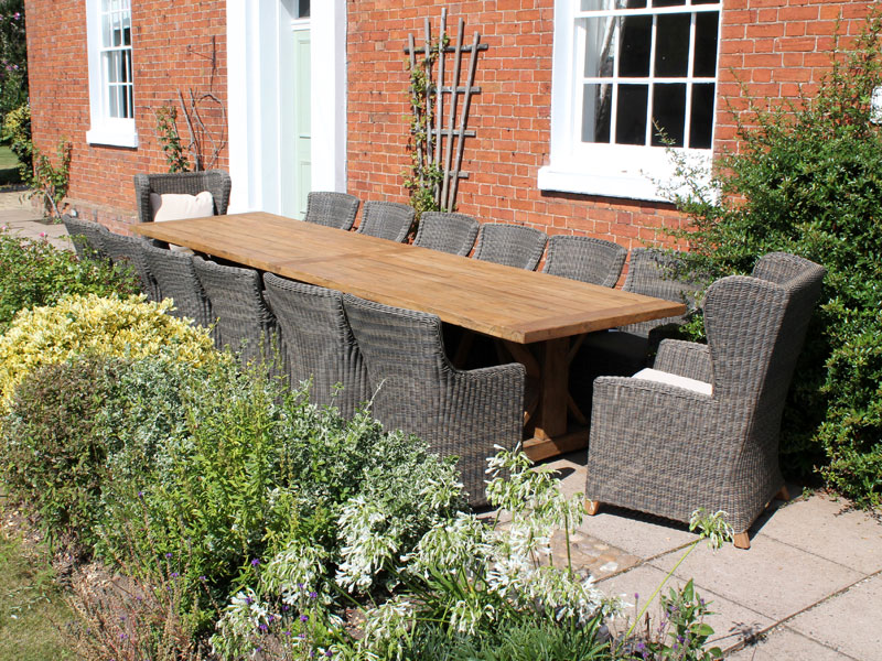 Product photograph of Valencia 14 Chair Wing Back Dining Set from The Garden Furniture Centre Ltd