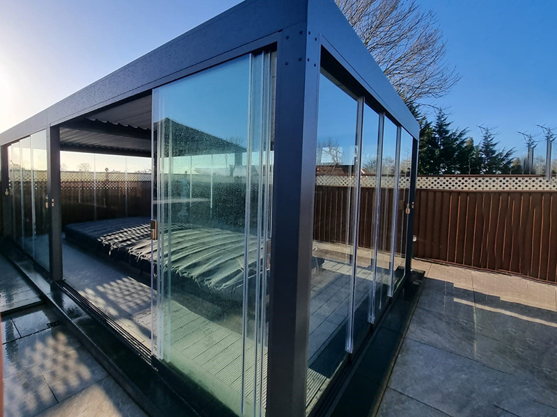 Product photograph of Pergolux 8 X 6m Free Standing Garden Room from The Garden Furniture Centre Ltd