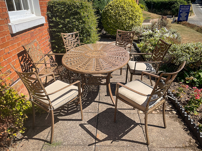 Product photograph of Leaf 6 Seater Oval Table And Chairs Set from The Garden Furniture Centre Ltd