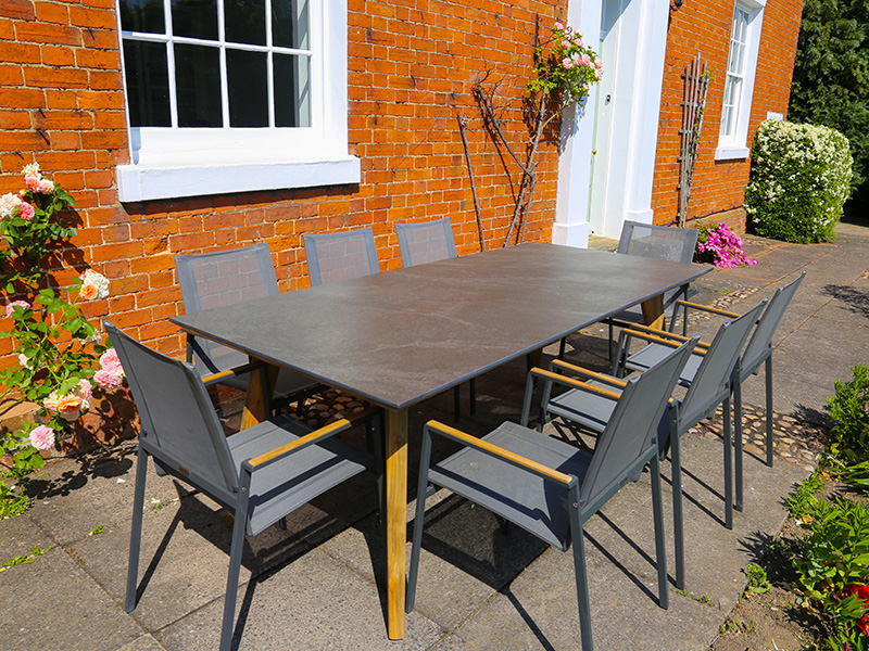 Product photograph of Ceramic 8 Chair Marbella Dining Set from The Garden Furniture Centre Ltd