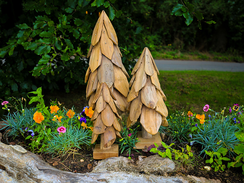 Product photograph of Teak Christmas Tree Set Of 3 from The Garden Furniture Centre Ltd