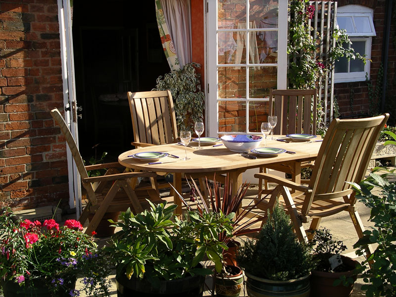 Product photograph of Classic 2m Table And Kingsbury Recliners from The Garden Furniture Centre Ltd