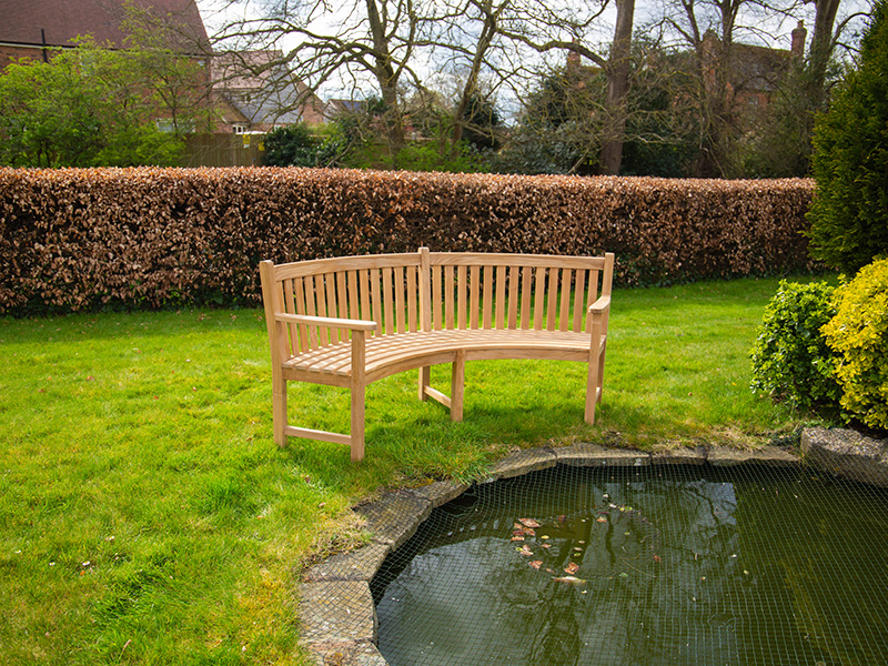 Product photograph of Contour Curved Bench With Arms from The Garden Furniture Centre Ltd