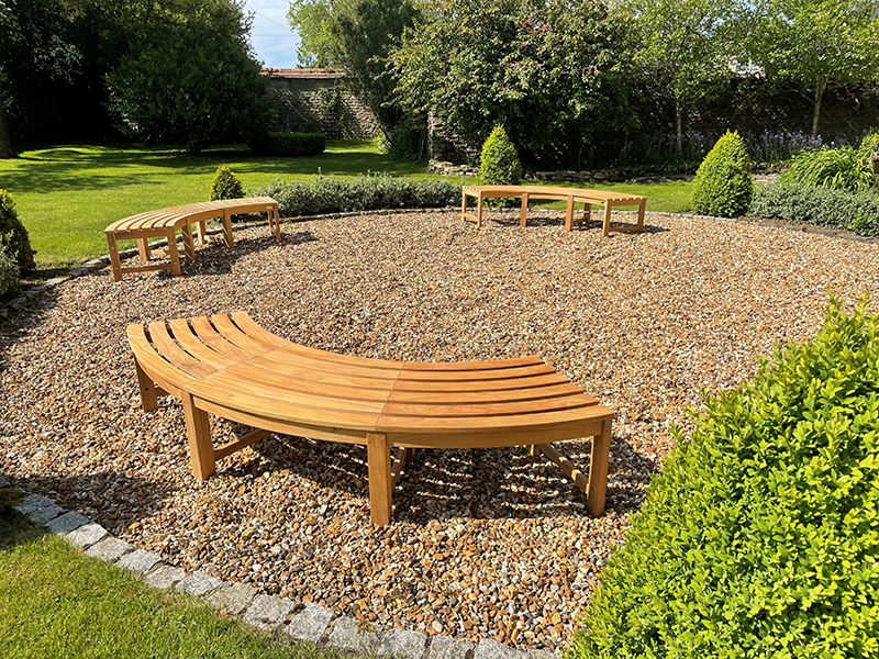 Product photograph of Curved Backless Bench Fsc Certified from The Garden Furniture Centre Ltd