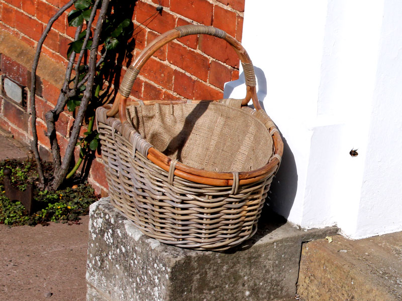 Product photograph of Kubu Oval Log Basket With Jute Lining from The Garden Furniture Centre Ltd